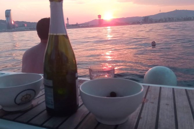 1h Refreshing Sailing Tour in Barcelona with Open Bar & Snacks - Sunset, daytime, and the question of swimming