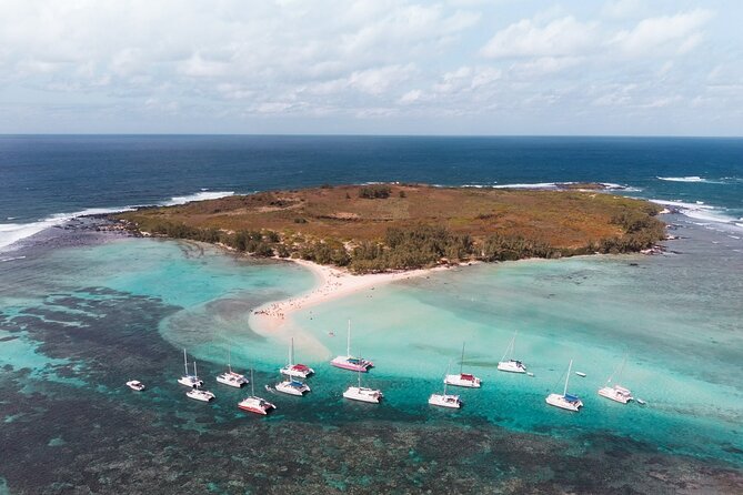3 North Islands Catamaran Cruise with Lunch & Drinks on island. - Passing Coin de Mire, or Gunner’s Quoin