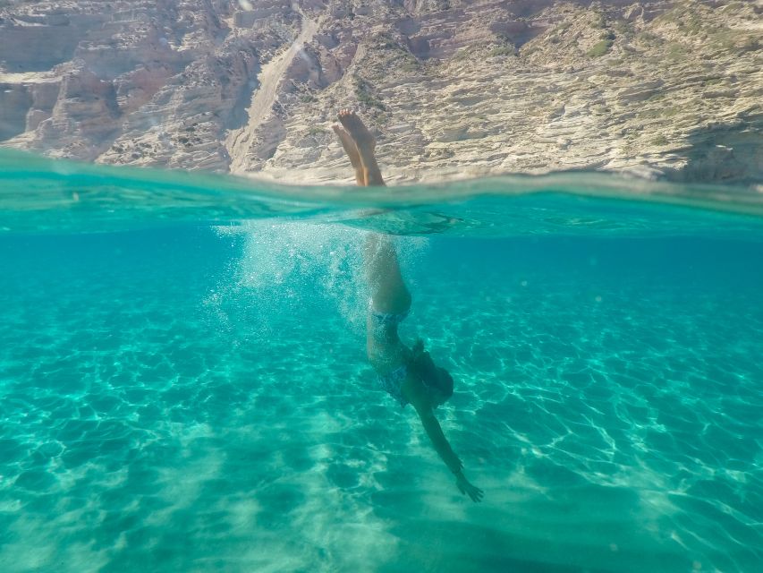 Adamas: Milos & Polyaigos Full-Day Sailboat Tour with Lunch - Gerakas and the emerald water