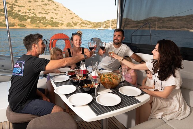 Ag.Nikolaos: Catamaran Trip with Sushi, Drinks, & Water Toys - Sunset Sailing Back to Agios Nikolaos