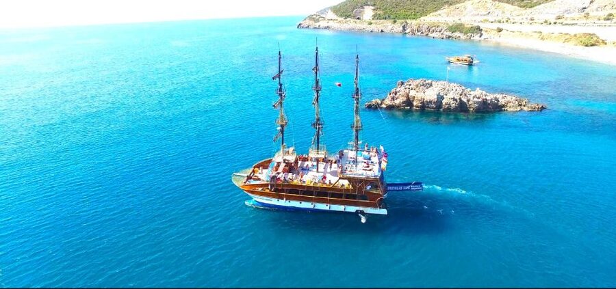 Alanya: Catamaran Boat Trip with Swim Stops and Sunbathing - Starting near the Red Tower and old shipyard
