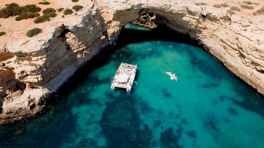 Albufeira: Caves and Coastline Catamaran Cruise to Benagil - What the crew adds to the experience