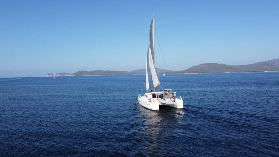 Alghero catamaran sunset tour Alghero - The crew sets the tone