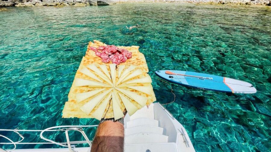 Alghero: Full day on a catamaran in Porto Conte Natural Park - Cala Inferno for swimming and snorkeling