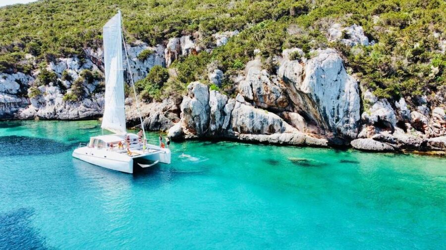 Alghero: Full day on a catamaran in Porto Conte Natural Park - Cala Dragunara and a long Sardinian lunch