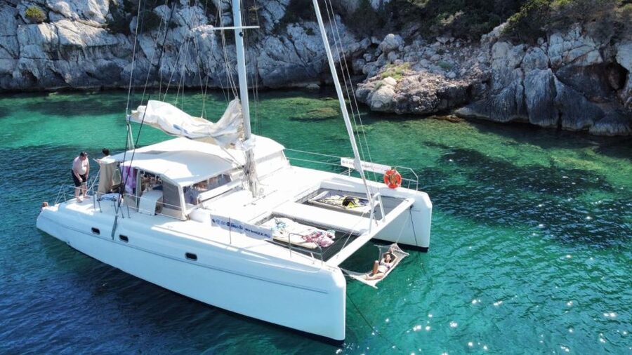 Alghero: Full day on a catamaran in Porto Conte Natural Park - Tony, the crew, and the mood on board