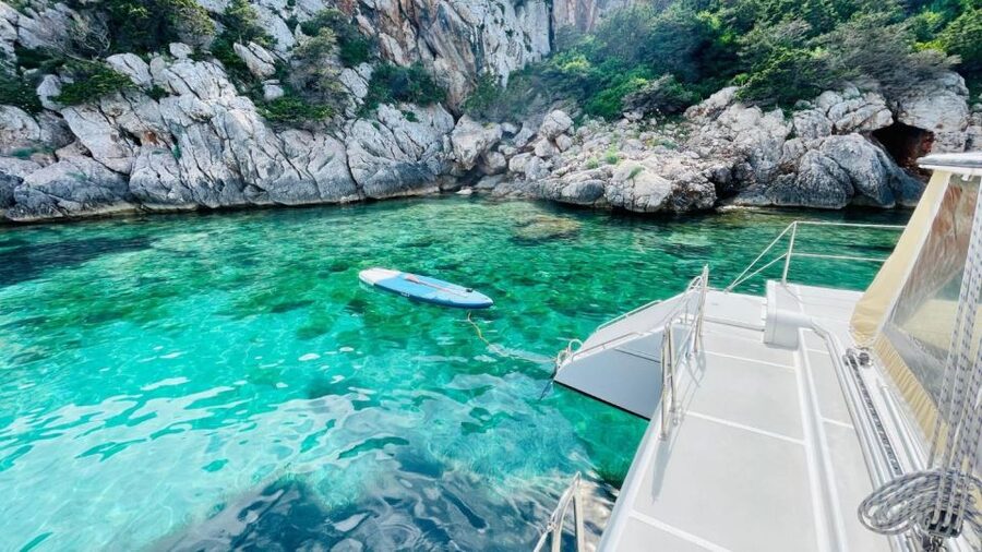 Alghero: Full day on a catamaran in Porto Conte Natural Park - Price, timing, and practical value