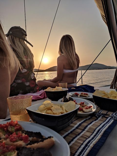 Alghero: Sunset Sailing Aperitif Experience - Swimming near Maddalenetta