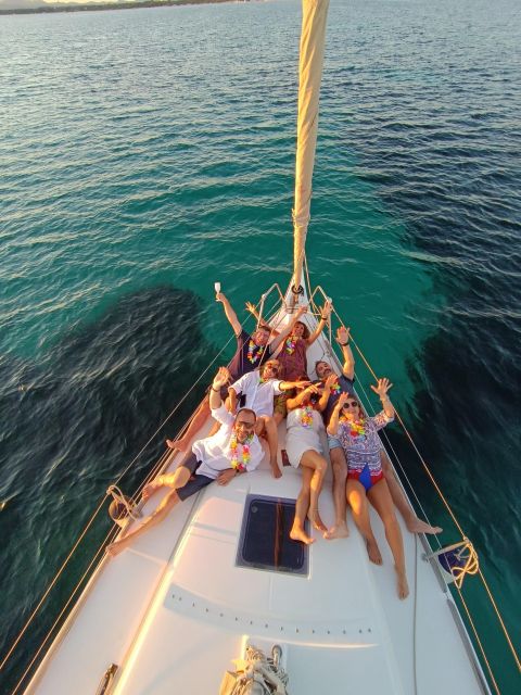 Alghero: Sunset Sailing Aperitif Experience - The view toward Alghero and Capo Caccia