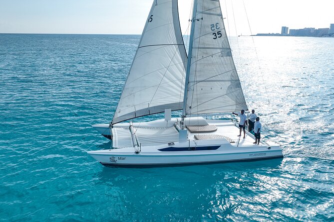 All-Inclusive Isla Mujeres Catamaran with Free Transportation - Lunch, drinks, and the Blanquizal sandbar