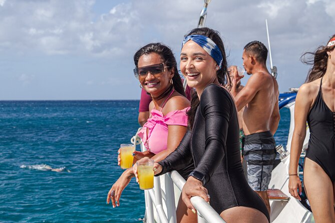 Aruba Afternoon Snorkel Sail aboard Palm Pleasure Catamaran - Crew help, equipment, and comfort in the water