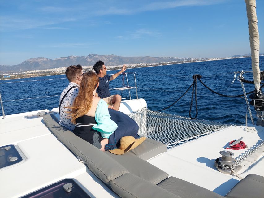 Athens: Catamaran Cruise with Fresh Lunch and Wine - Hydroussa islet: your first swim from the boat