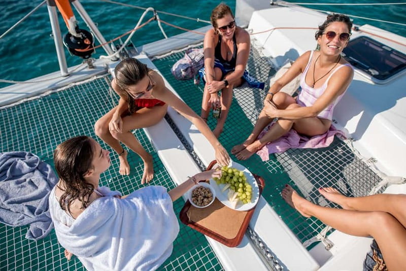 Athens: Half-Day Morning Catamaran Cruise with Meal & Drinks - Sailing south past Vouliagmeni Bay