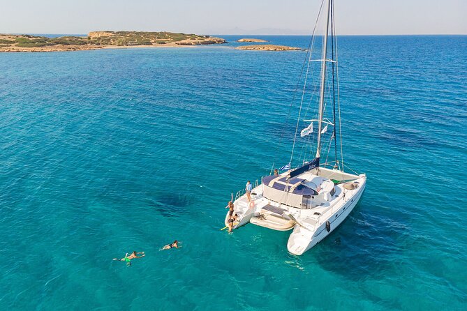 Athens Private Full day Catamaran cruise with meal & drinks - Sailing across the Saronic Gulf