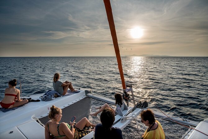 Athens Semi Private Sunset Catamaran Cruise with meal & drinks - Kavouri Beach and sheltered water near Hydrousa