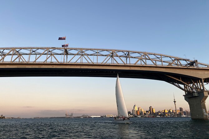 Auckland Harbour Sailboat Cruise Including Three Course Dinner - Sky Tower, Ferry Building, and the city lights