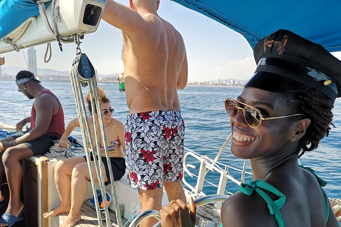 Authentic Barcelona Sailing Tour with Swim & Drinks - Port Vell and the city’s landmark skyline
