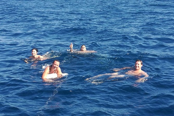 Authentic Barcelona Sailing Tour with Swim & Drinks - Pont del Petroli and time for a swim
