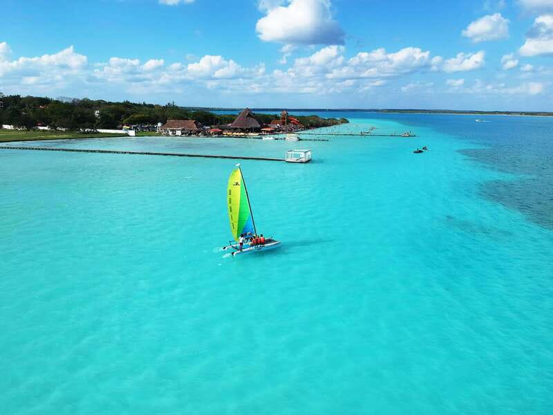 Bacalar: Group Sailing Tour with Guide - Drinks, swimming time, and the relaxed pace