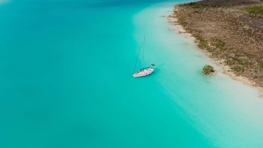 Bacalar Lagoon Sailing Tour with Open Bar and Mexican Lunch - Cenotes with changing colors