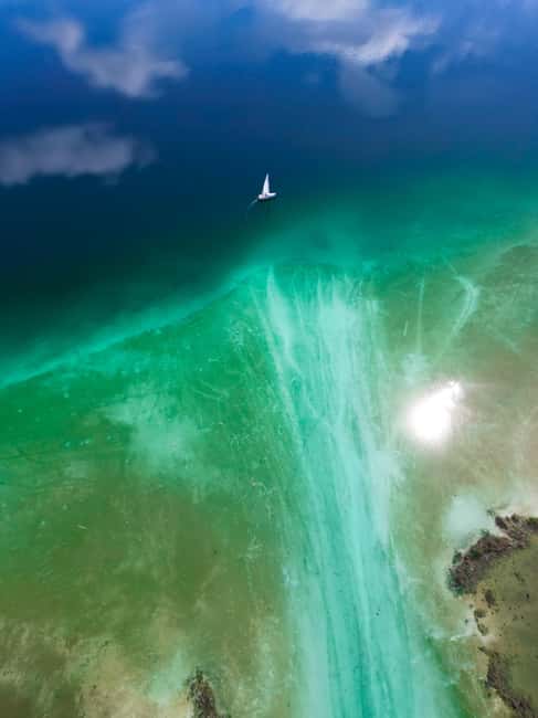 Bacalar: Lagoon Sailing Tour with Snacks and Drinks - Crossing the lagoon’s cenotes and mangroves