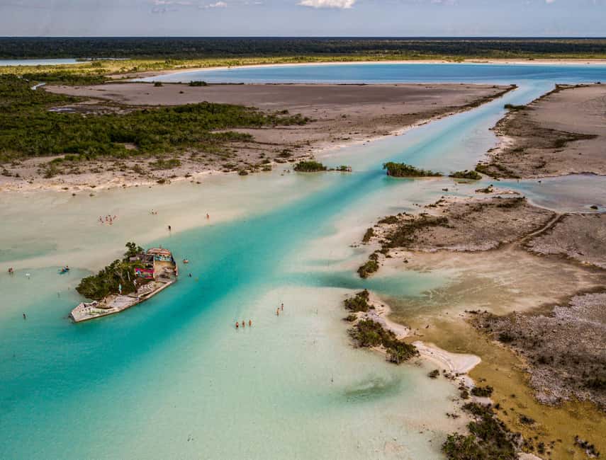Bacalar: Lagoon Sailing Tour with Snacks and Drinks - Setting sail with a bilingual female crew