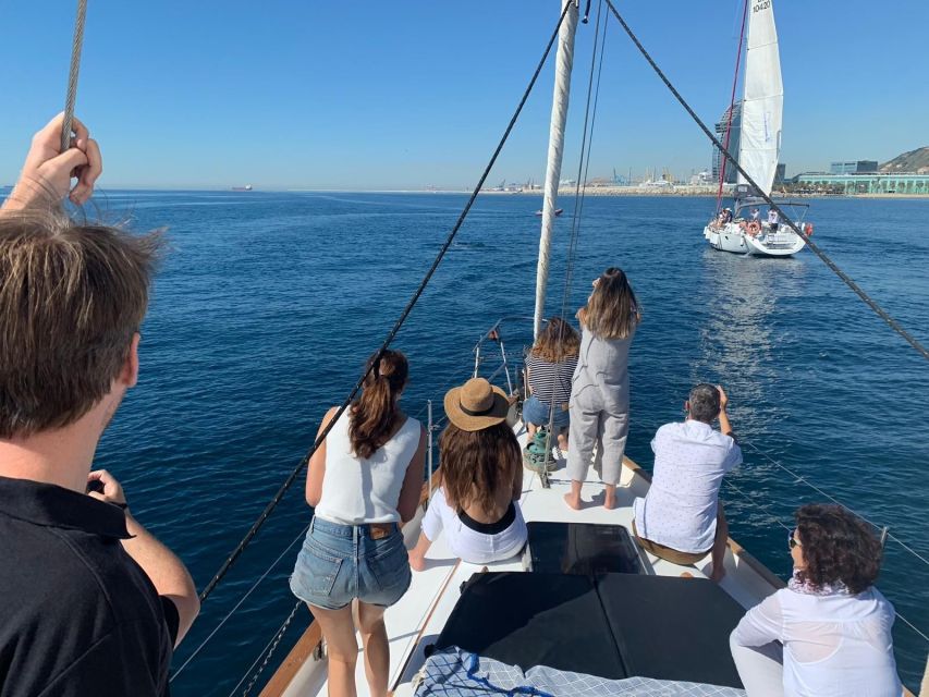 Barcelona: 2-Hour Sailboat Tour with Paddle Boarding - Spotting Sagrada Familia, Torre Agbar, and Montjuic offshore