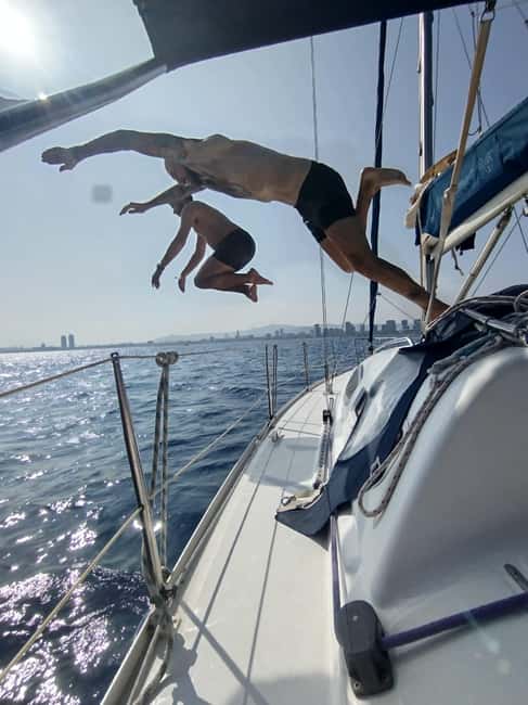 Barcelona Badalona : Sailboat Tour, Snacks, Drinks, Swimming - What makes this different from a standard Barcelona cruise