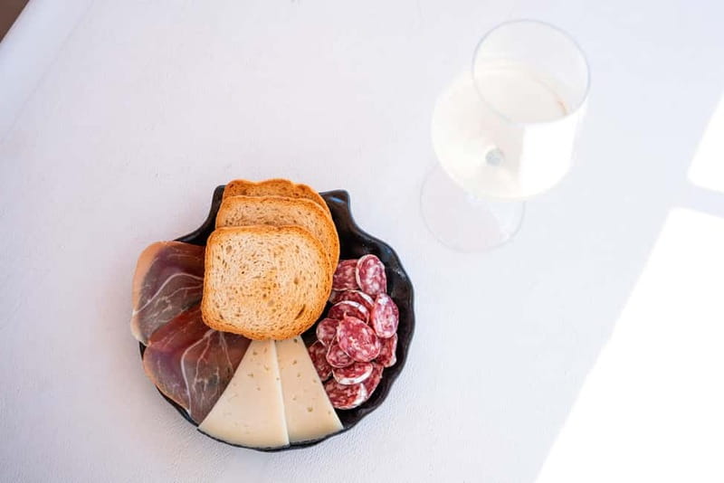 Barcelona: Catamaran Cruise w/ Sailing, Wine, & Tapa - Language, timing, and booking details