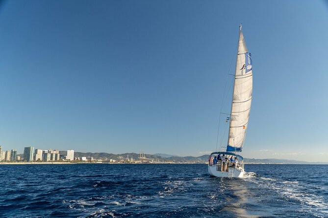 Barcelona Coastal Sailing (Open Bar, Catalan Snack & Swim Stop) - Sunset, Tibidabo, and the ride back