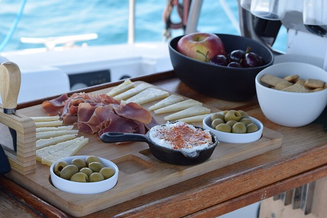 Barcelona Coastal Sailing (Open Bar, Catalan Snack & Swim Stop) - Booking, weather, and cancellation details