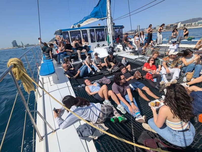 Barcelona: Luxury Catamaran Sunset Cruise - Sailing out of Port Olimpic at sunset