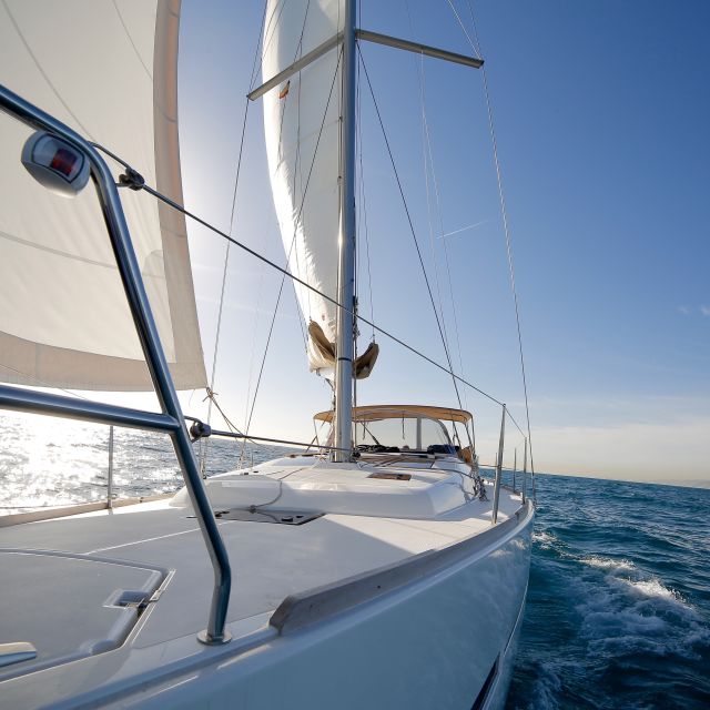 Barcelona: Midday or Sunset Sailing with Open Bar and Snacks - Open bar, snacks, and the onboard mood