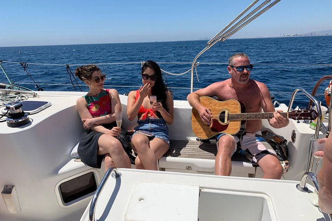 Barcelona Private Sailing Tour with Drinks for Family and Friends - What the captains add to the experience