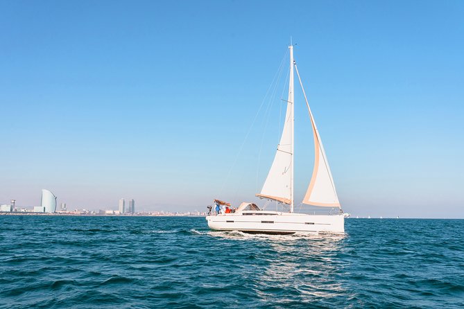 Barcelona Sailing: Light Snacks & Open Bar with Private Option - Drinks, tapas, and the social side
