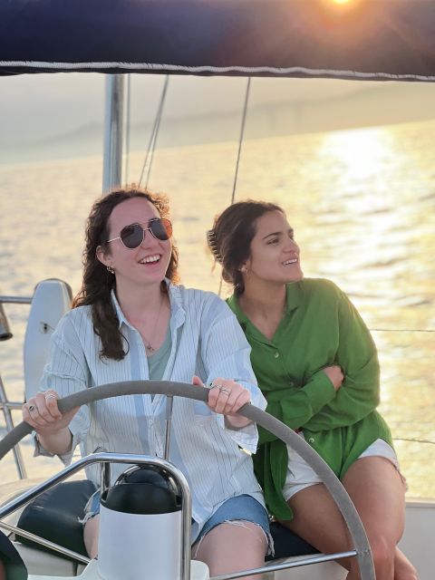 Barcelona: Sailing Tour with a Glass of Cava - Hoisting the mainsail and genoa