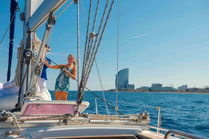 Barcelona: Sailing Tour with Young Local Captain & Drinks - Port Vell and the city’s polished waterfront