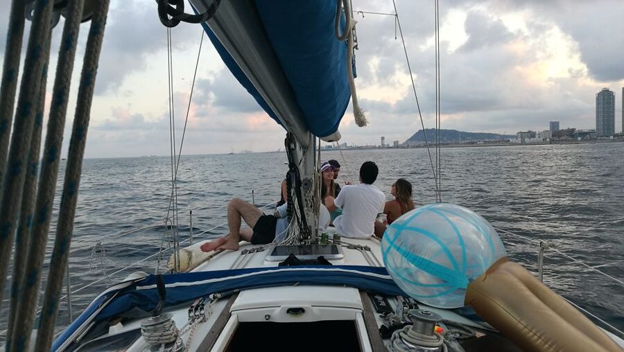 Barcelona: Sailing Trip with Drinks and Snacks - Barcelona’s skyline from a small sailing boat