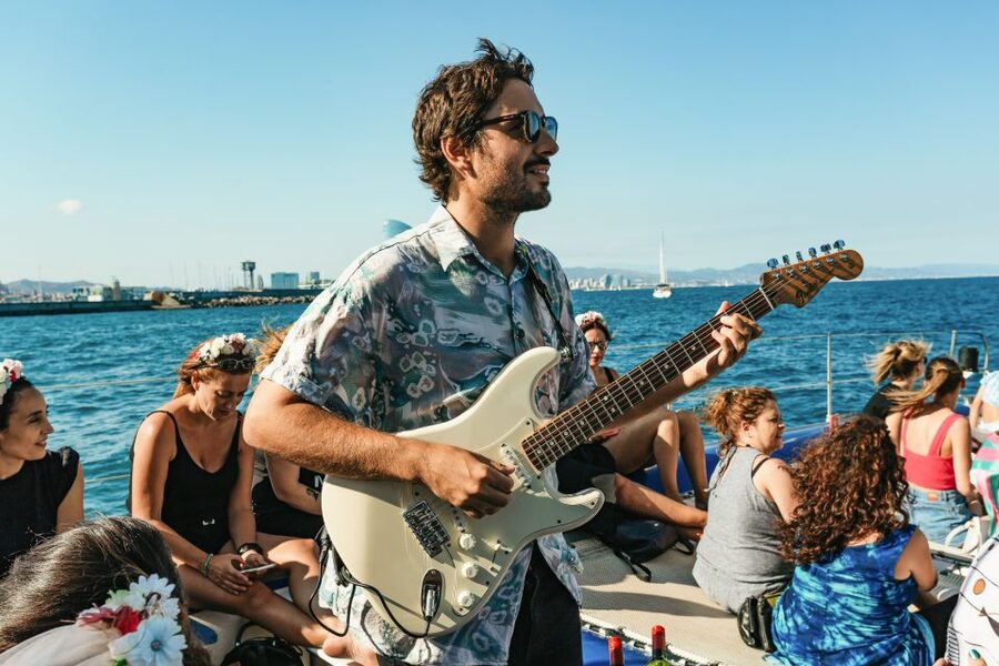Barcelona: Sunset Catamaran Cruise with Live Music - The best time to go, from summer warmth to winter chill