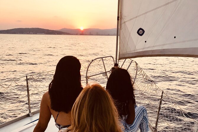 Barcelona Sunset Private Sailing with Live Saxophone and Open bar - Cruising toward Port Vell