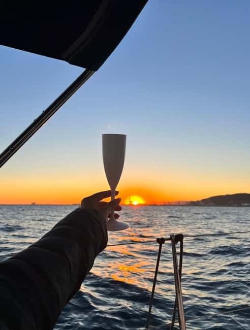Barcelona: Sunset Sailboat Cruise with Open Bar and Snacks - Key points at a glance