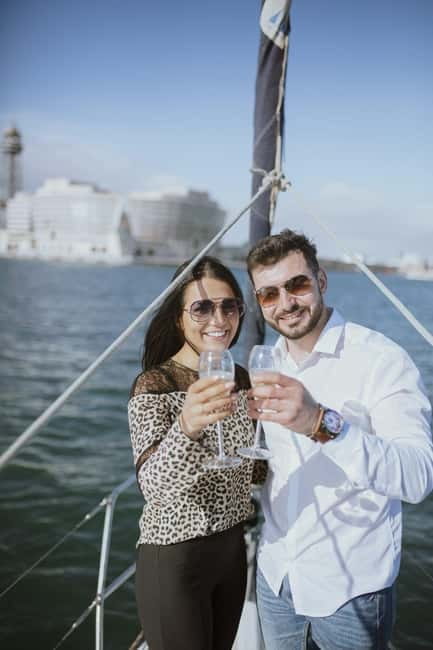 Barcelona: Sunset Sailboat Cruise with Open Bar and Snacks - One hour along Barceloneta Beach