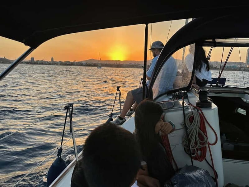 Barcelona: Sunset Sailboat Cruise with Open Bar and Snacks - Cava, juices, and the snack question