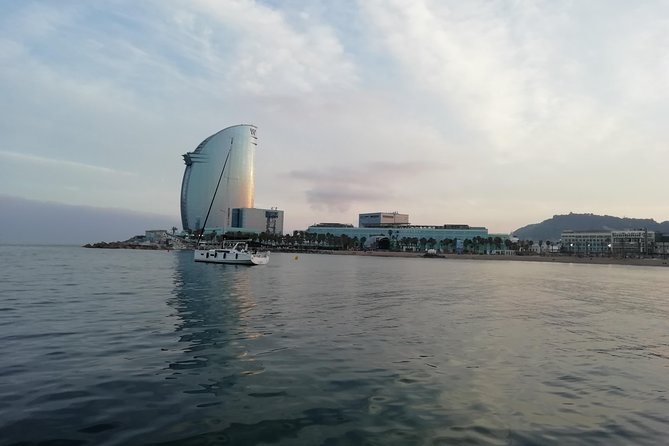 Barcelona Sunset Sailing Cruise from Port Olímpic with Open Bar - Meeting at Port Olímpic