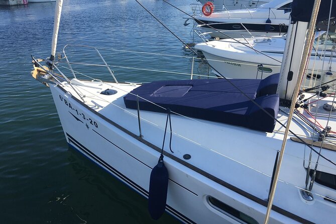 Barcelona Sunset Sailing with Open Bar of Cava and Snacks - Cava, conversation, and the practical side of comfort