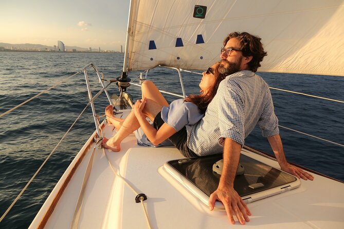 Barcelona Unique Sunset Sailing Experience with Tapas & Open Bar - A sunset view of Barcelona that feels different