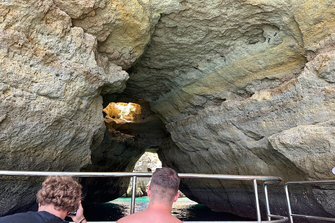 Benagil Caves & Coast from Portimão on an Eco-Friendly Catamaran - Farol de Alfanzina and the first cave experience