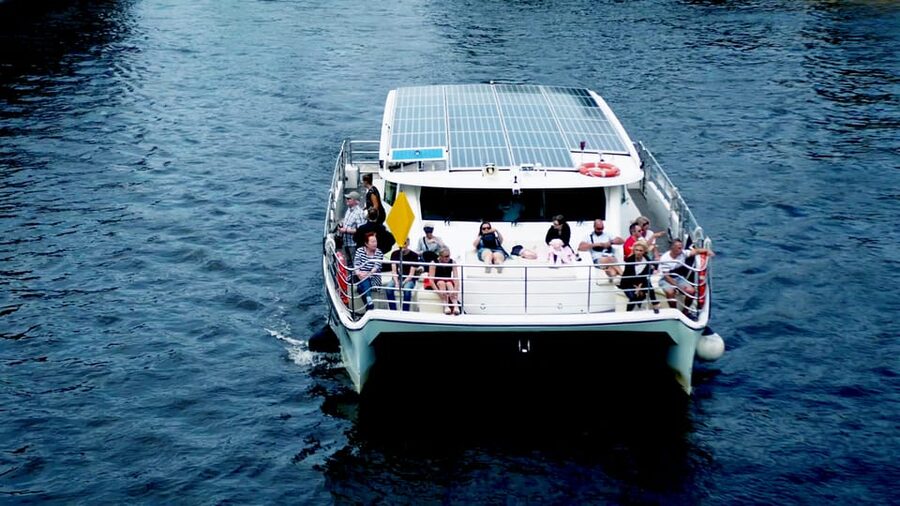 Berlin: Exclusive Boat Tour on a Solar-Powered Catamaran - Audio guides, crew, and the onboard mood