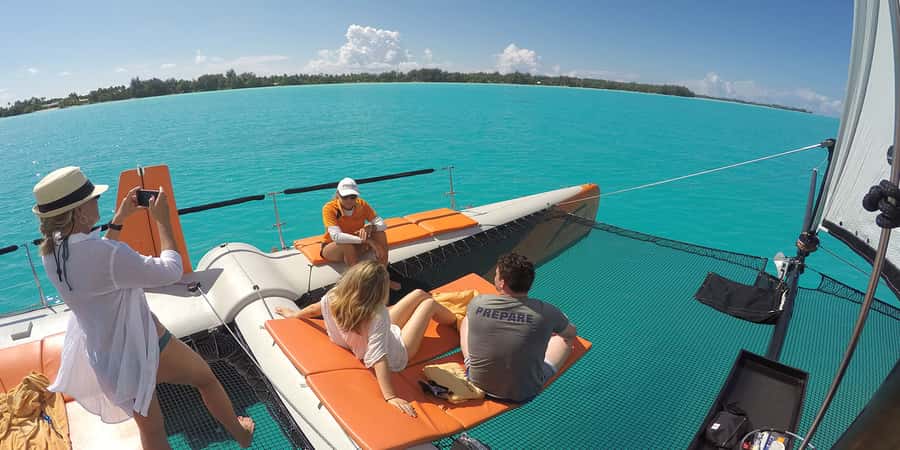 Bora Bora: Sunset Catamaran Cruise with Snacks and Drinks - A small catamaran with room to settle in