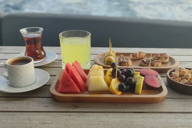Bosphorus Sunset Cruise on Luxury Yacht with Transfers - Dolmabahçe Palace and Çırağan Palace from the water